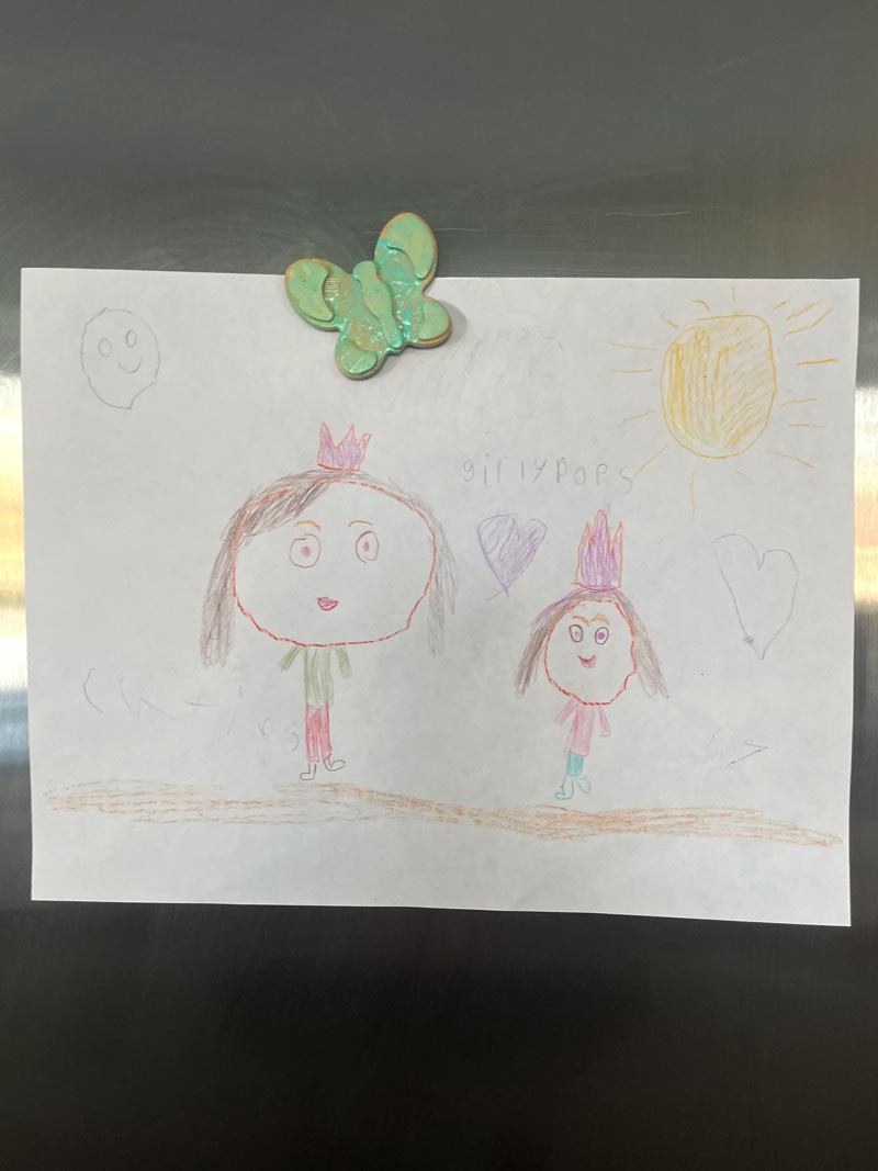 A drawing by Abby's daughter of the two of them together