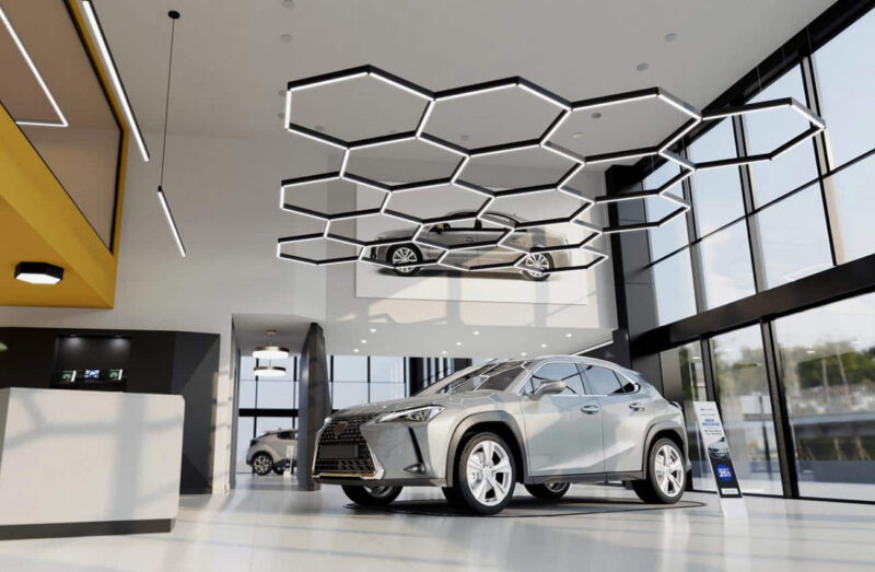 A rendering of Camman's Infinilite geometric lighting installed in a car dealership