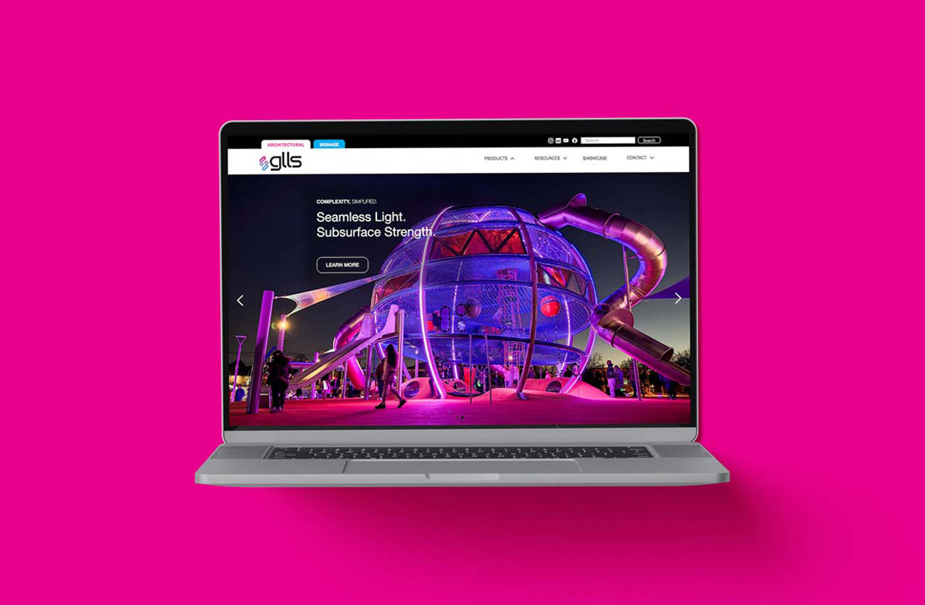 GLLS's updated website home page on a laptop screen