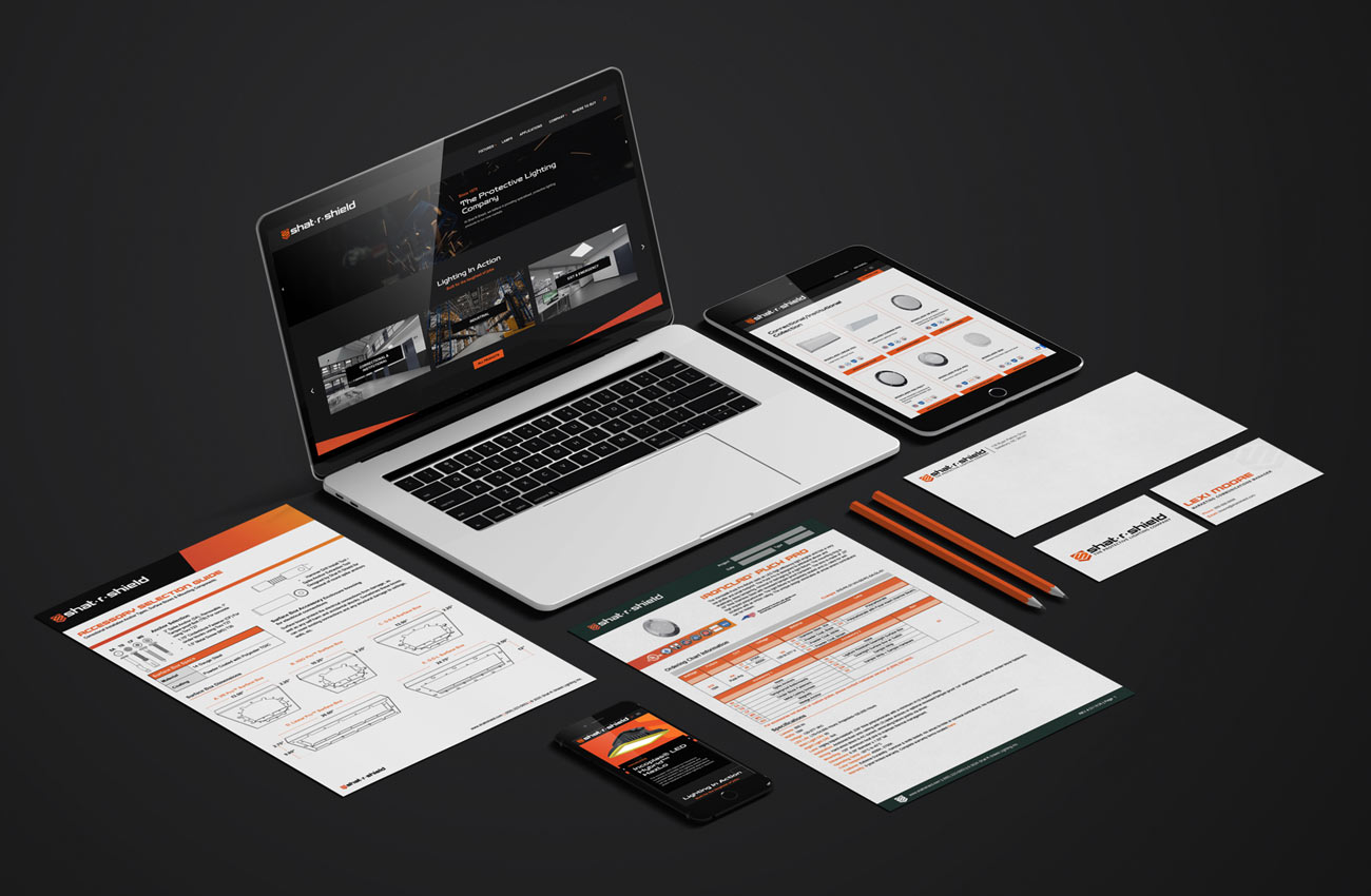 Various deliverables from the Shat-R-Shield rebrand project, including spec sheets, other print materials, and a refreshed website